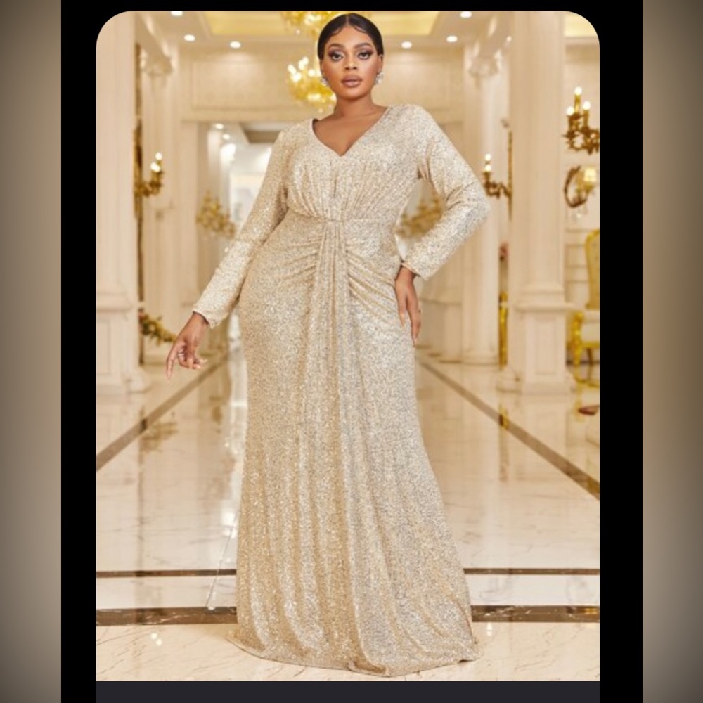 Beautiful long sleeve sequin gown in gold